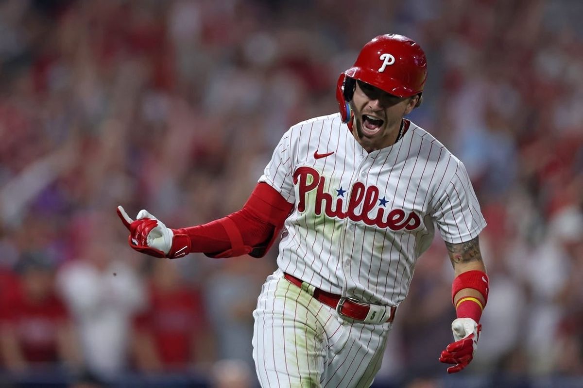 Oct 3, 2023; Philadelphia, Pennsylvania, USA; Philadelphia Phillies second baseman Bryson Stott (5) reacts after hitting a RBI single in the fourth inning against the Miami Marlins for game one of the Wildcard series for the 2023 MLB playoffs at Citizens Bank Park.