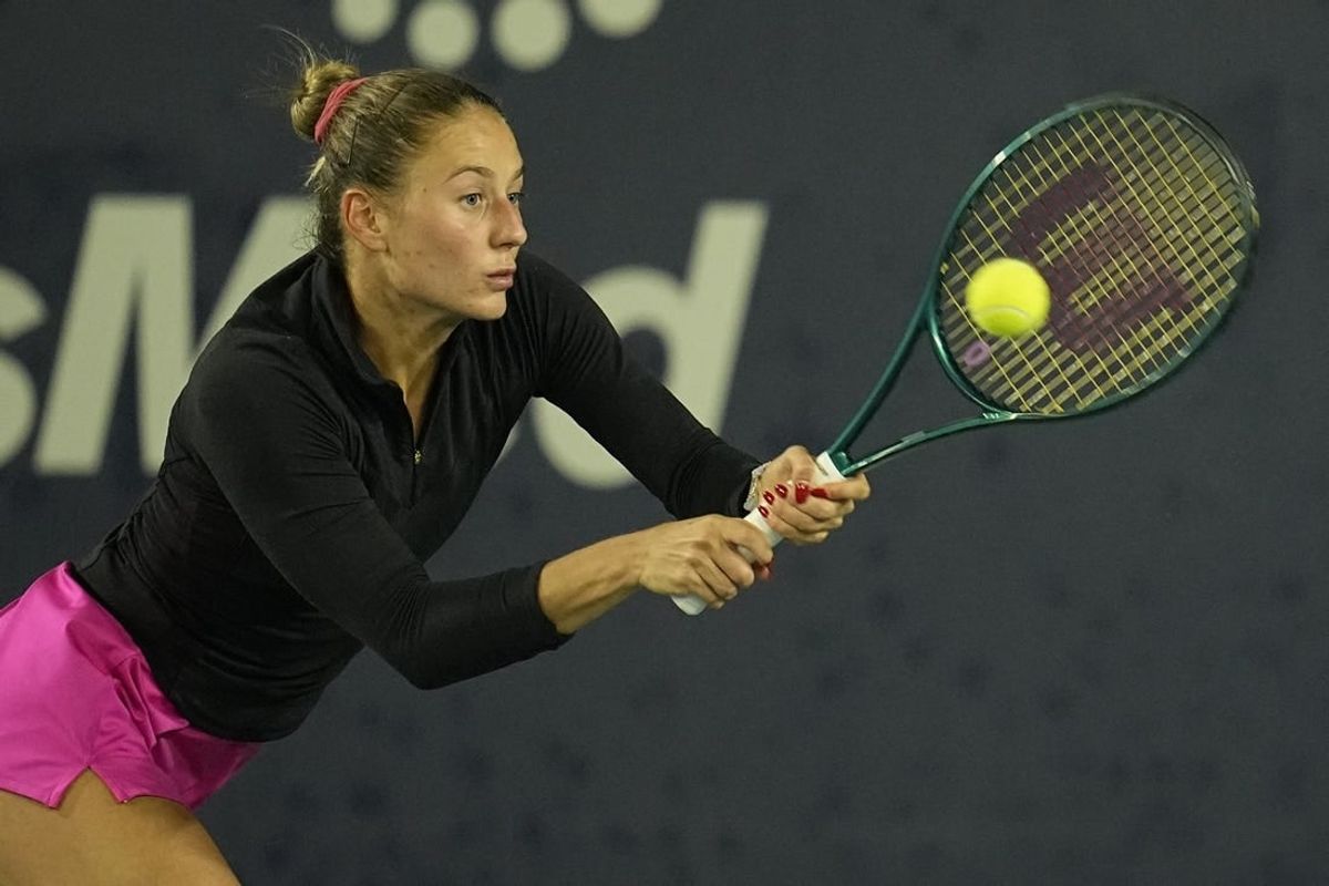 Mar 2, 2024; San Diego, CA, USA; Marta Kostyuk of Ukraine hits a backhand against Jessica Pegula of the United States (not pictured) during the second set of the semifinals of the San Diego Open at Barnes Tennis Center.