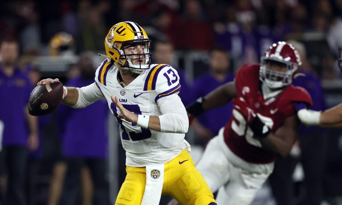 Nov 4, 2023; Tuscaloosa, Alabama, USA; LSU Tigers quarterback Garrett Nussmeier (13) throws  pass against the Alabama Crimson Tide during the second half at Bryant-Denny Stadium.