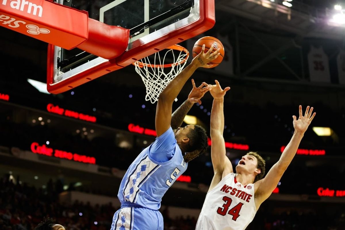 Jan 10, 2024; Raleigh, North Carolina, USA; North Carolina Tar Heels forward Armando Bacot (5) shoots the ball during the first half against North Carolina State Wolfpack at PNC Arena.