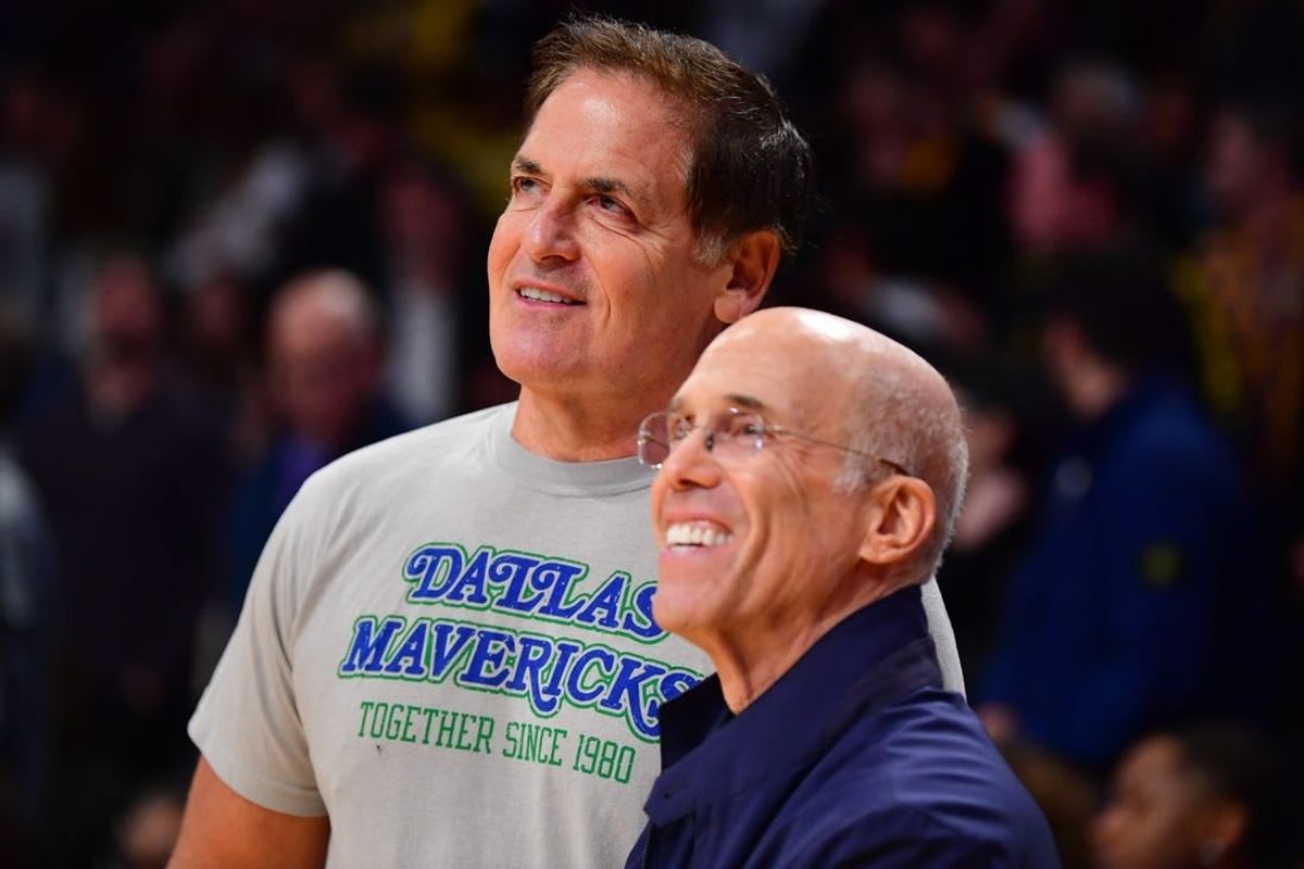 Nov 22, 2023; Los Angeles, California, USA; Dallas Mavericks owner Mark Cuban meets with media executive Jeffrey Katzenberg at Crypto.com Arena.