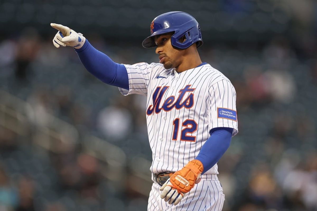 Sep 27, 2023; New York City, New York, USA; New York Mets shortstop Francisco Lindor (12) reacts after two RBI single during the seventh inning against the Miami Marlins at Citi Field.