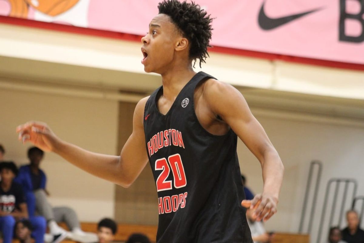 Tre Johnson (20 reacts to a play during an AAU basketball game July 4, 2023, at the Nike EYBL Peach Jam in North Augusta, S.C. A Kentucky target, Johnson is considered one of the shooting guards in the Class of 2024.