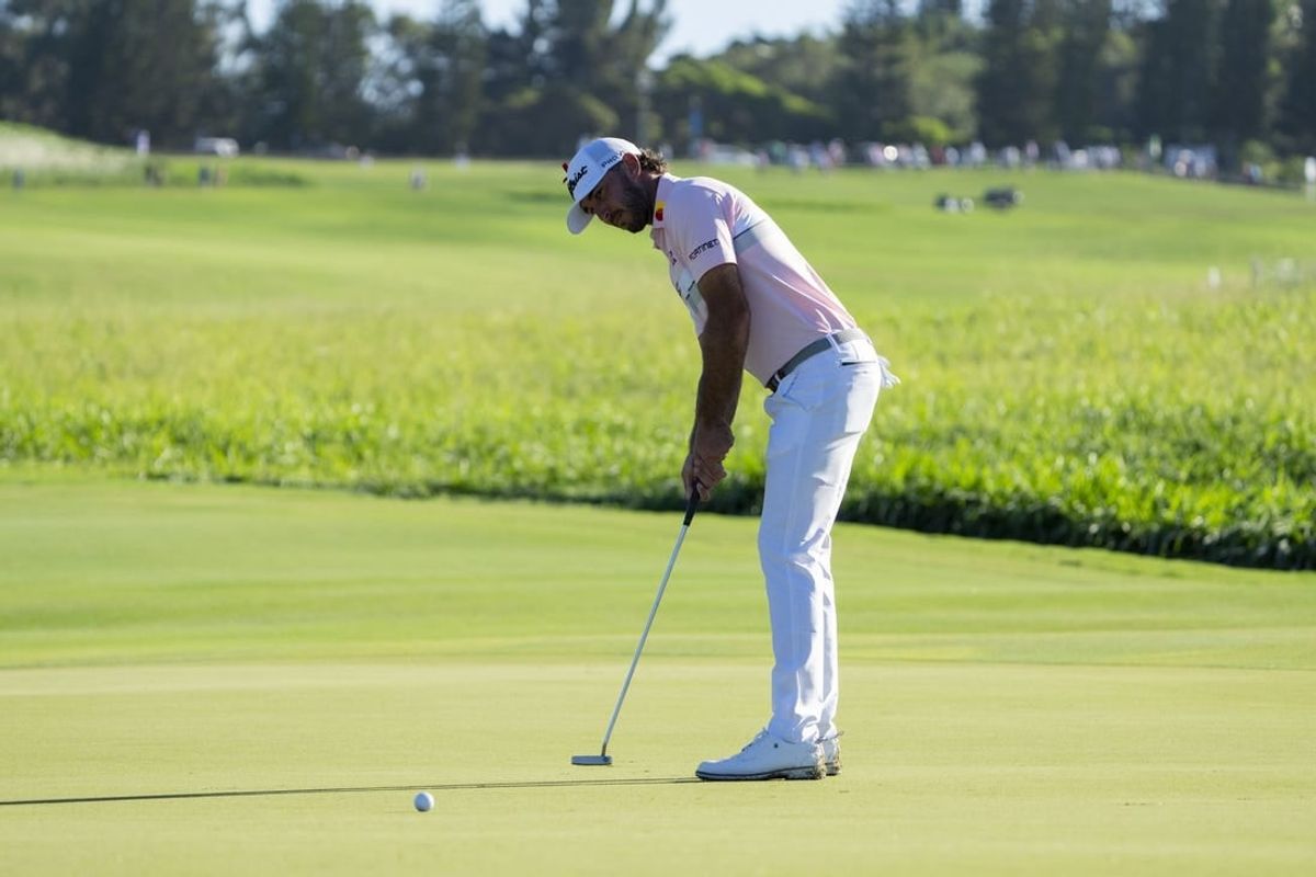 January 7, 2024; Maui, Hawaii, USA; Max Homa putts on the second hole during the final round of The Sentry golf tournament at Kapalua Golf - The Plantation Course.