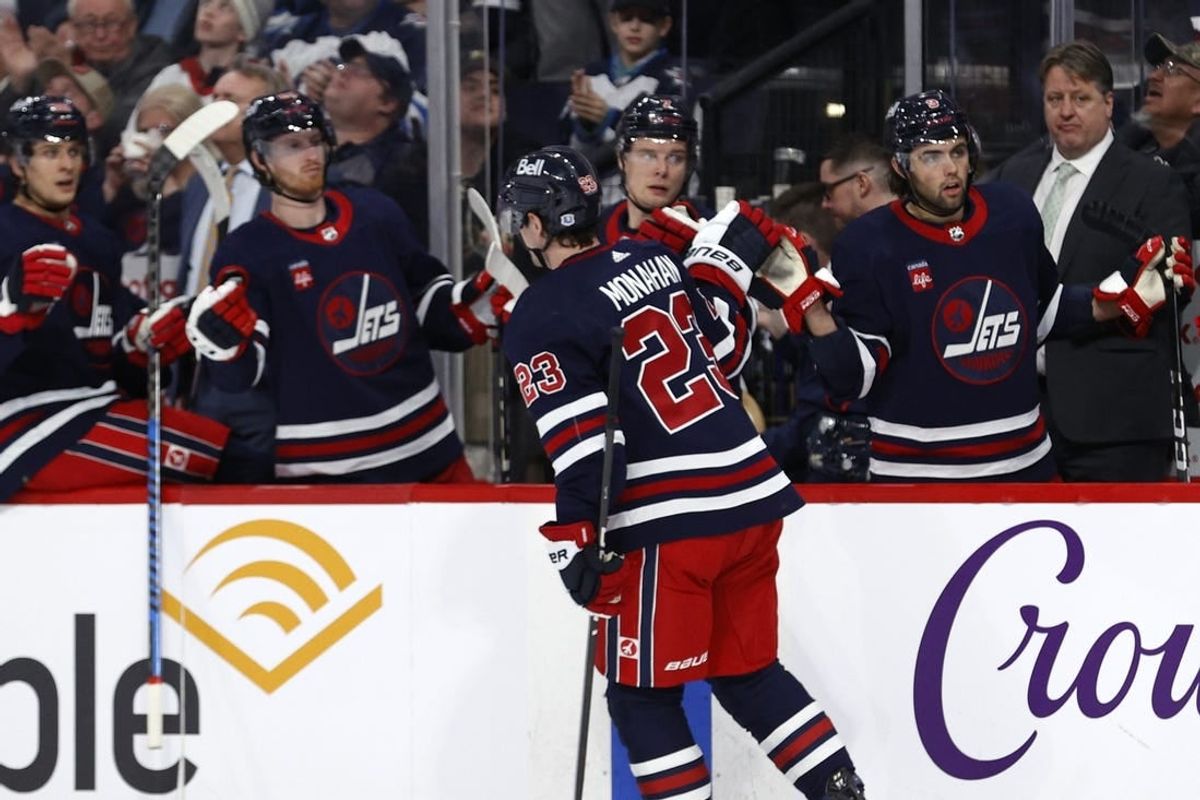 Mar 28, 2024; Winnipeg, Manitoba, CAN; Winnipeg Jets center Sean Monahan (23) celebrates his second period goal against the Vegas Golden Knights at Canada Life Centre.