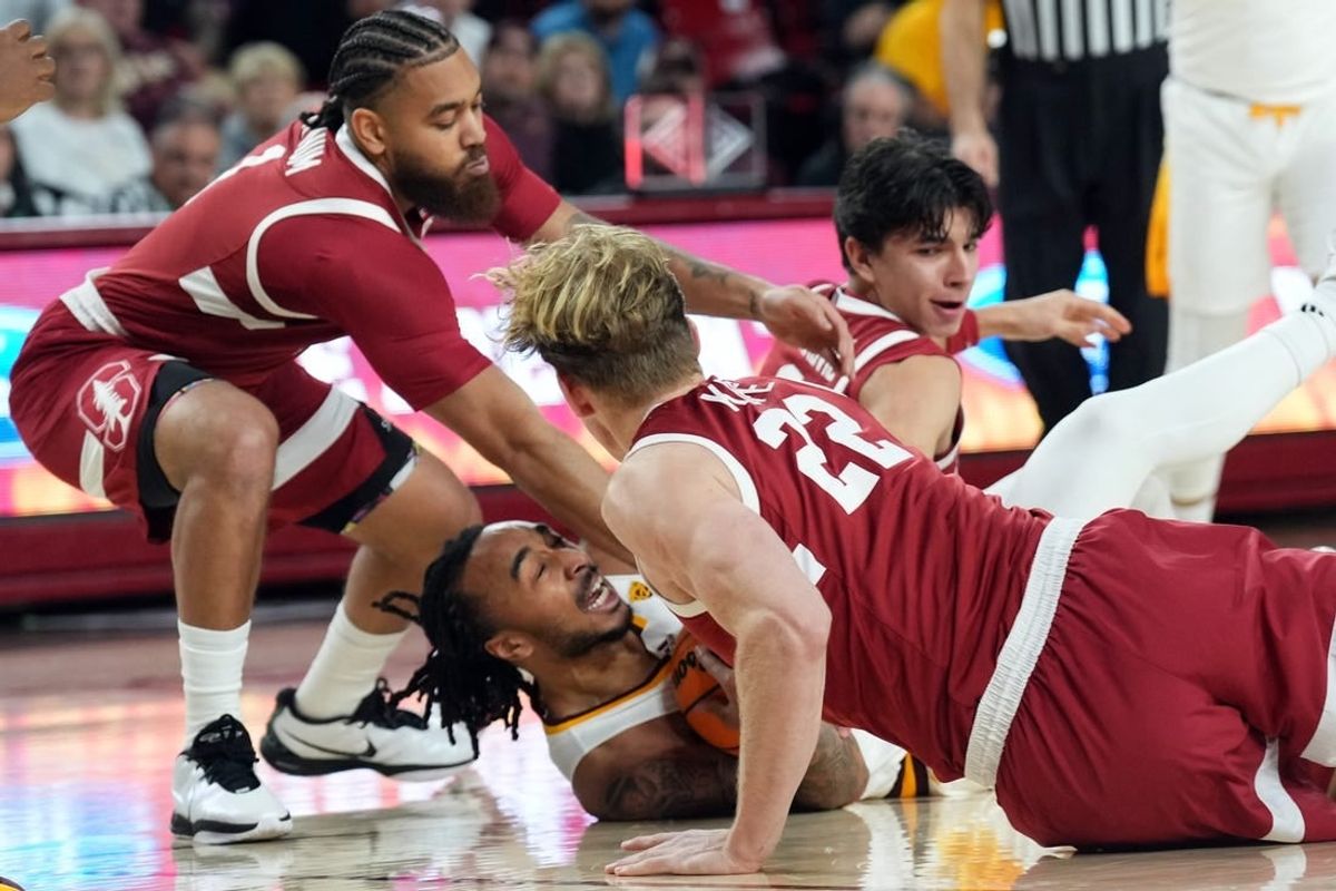 Feb 1, 2024; Tempe, Arizona, USA; Arizona State Sun Devils guard Frankie Collins (1) protects the ball from Stanford Cardinal forward James Keefe (22) and Stanford Cardinal guard Jared Bynum (1) during the first half at Desert Financial Arena.