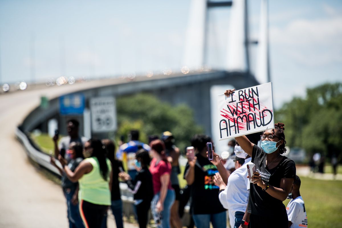 Protesters gather at Sidney Lanier Bridge in McGlynn, Ga., where Ahmaud Arbery loved to run.
