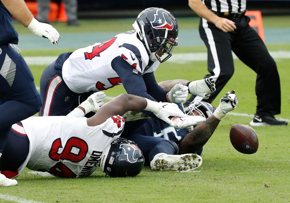 Texans LB Jacob Martin (top) is latest NFL gridder to test positive for COVID-19.