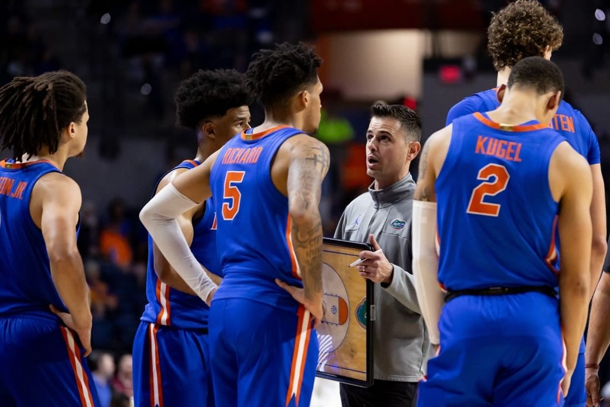 Nov 17, 2023; Gainesville, Florida, USA; Florida Gators head coach Todd Golden talks with Florida Gators guard Zyon Pullin (0), Florida Gators guard Walter Clayton Jr. (1), Florida Gators guard Will Richard (5), and Florida Gators guard Riley Kugel (2) during the second half against the Florida State Seminoles at Exactech Arena at the Stephen C. O'Connell Center.