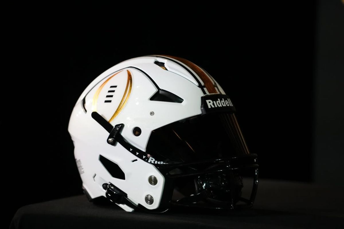 Jan 7, 2024; Houston, TX, USA; A helmet with the College Football Playoff logo at the CFP National Championship Head Coaches press conference at JW Marriot Houston by the Galleria.