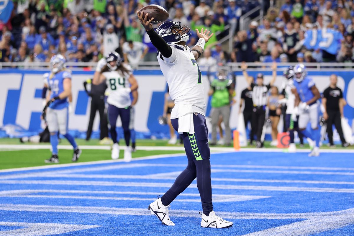 Seahawks QB Geno Smith celebrates in the end zone.