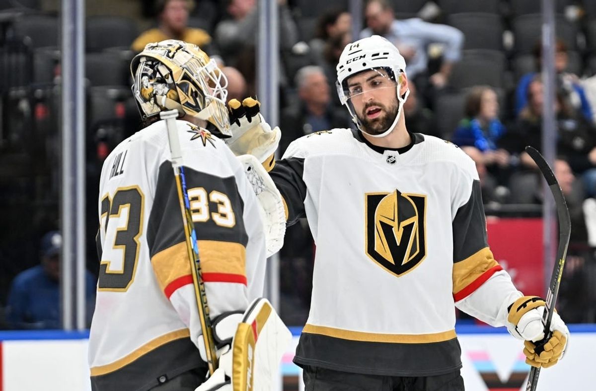 Feb 27, 2024; Toronto, Ontario, CAN;  Vegas Golden Knights defenseman Nicolas Hague (14)greets goalie Adin Hill (33) as they celebrate a win over the Toronto Maple Leafs at Scotiabank Arena.