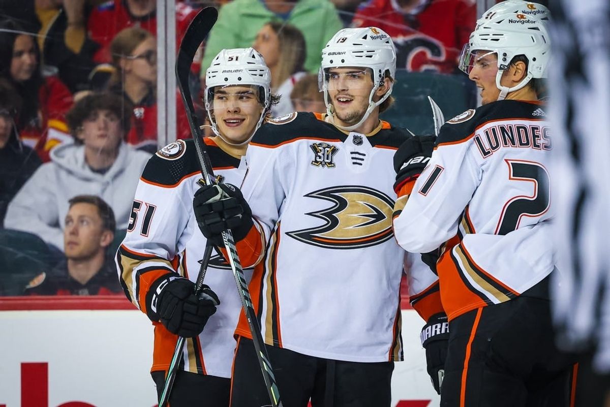 Apr 2, 2024; Calgary, Alberta, CAN; Anaheim Ducks right wing Troy Terry (19) celebrates his goal with teammates against the Calgary Flames during the second period at Scotiabank Saddledome.
