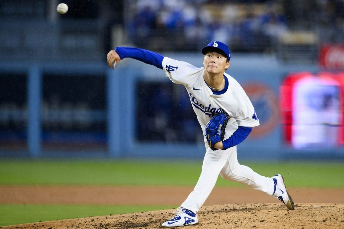 Mar 30, 2024; Los Angeles, California, USA; Los Angeles Dodgers starting pitcher Yoshinobu Yamamoto (18) throws out a pitch during the fourth inning against the St. Louis Cardinals at Dodger Stadium.