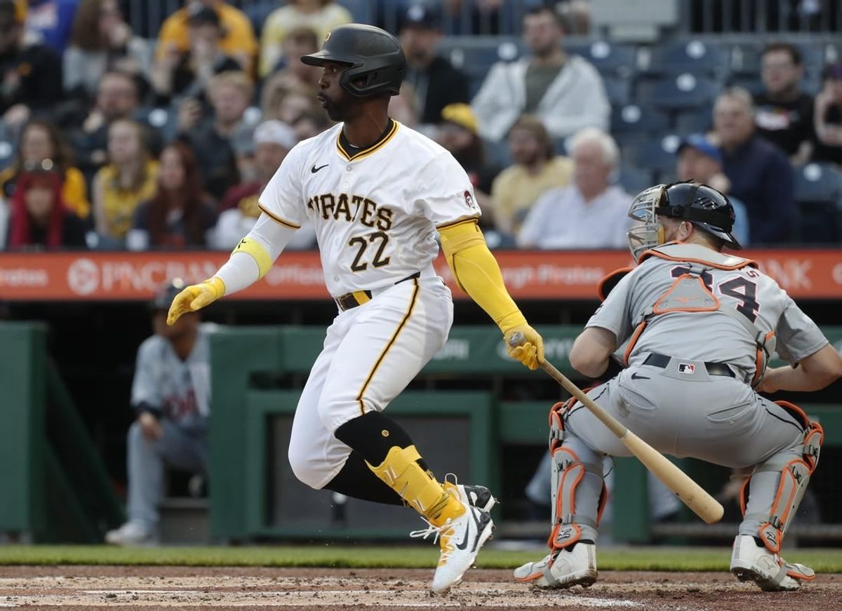 Apr 8, 2024; Pittsburgh, Pennsylvania, USA;  Pittsburgh Pirates designated hitter Andrew McCutchen (22) hits a single against the Detroit Tigers during the second inning at PNC Park.