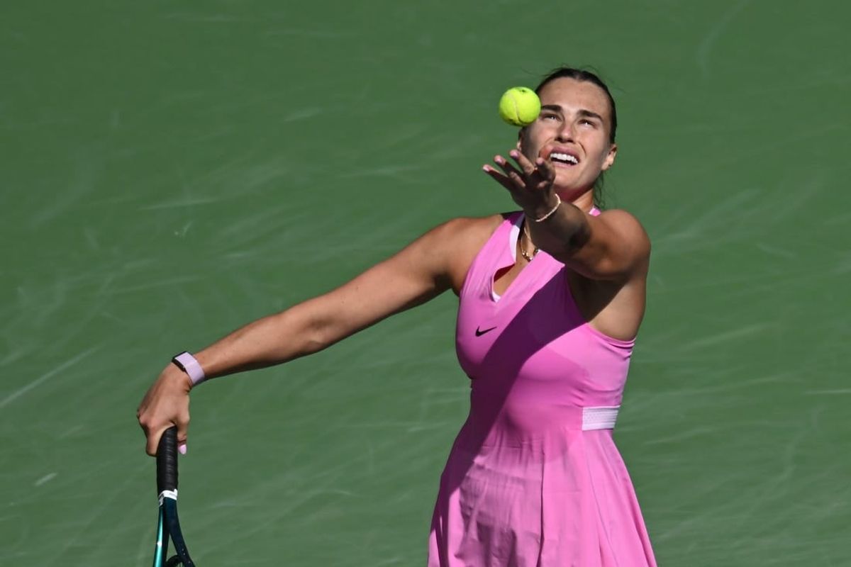 Mar 11, 2024; Indian Wells, CA, USA; Aryna Sabalenka hits a serve in her third round match against Emma Raducanu (GBR) during the BNP Paribas Open at Indian Wells Tennis Garden.