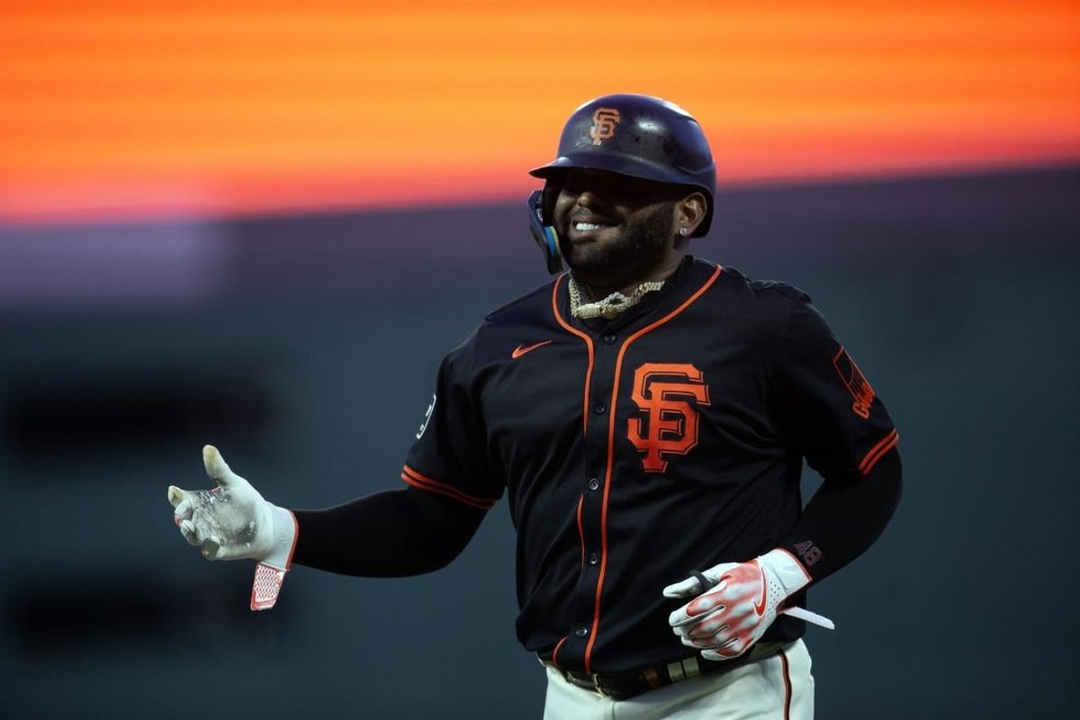 Mar 26, 2024; San Francisco, California, USA; San Francisco Giants third baseman Pablo Sandoval smiles as he is removed for a pinch runner after singling against the Oakland Athletics during the ninth inning at Oracle Park.