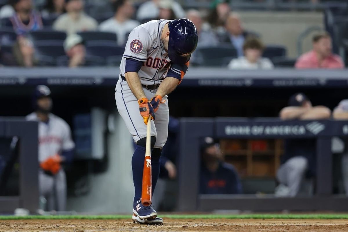 May 8, 2024; Bronx, New York, USA; Houston Astros second baseman Jose Altuve (27) reacts after hitting a fly ball to center field during the fifth inning against the New York Yankees at Yankee Stadium.