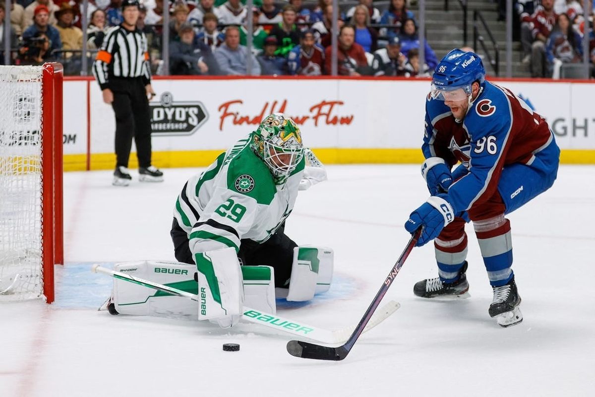 May 11, 2024; Denver, Colorado, USA; Dallas Stars goaltender Jake Oettinger (29) defends against Colorado Avalanche right wing Mikko Rantanen (96) in the second period in game three of the second round of the 2024 Stanley Cup Playoffs at Ball Arena.