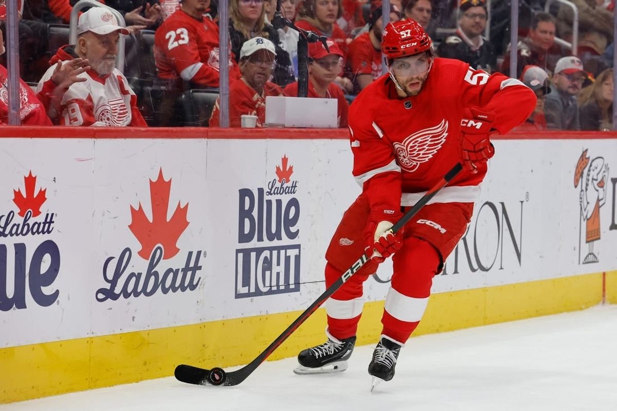 Oct 22, 2023; Detroit, Michigan, USA;  Detroit Red Wings left wing David Perron (57) skates with the puck in the third period against the Calgary Flames at Little Caesars Arena.