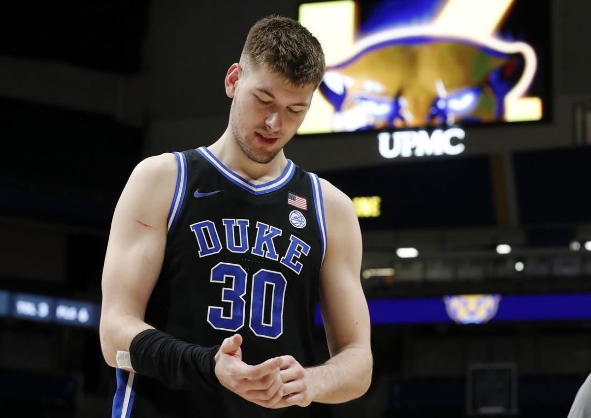 Jan 9, 2024; Pittsburgh, Pennsylvania, USA;  Duke Blue Devils center Kyle Filipowski (30) reacts as he leaves the court after defeating the Pittsburgh Panthers at the Petersen Events Center. Duke won 75-53.