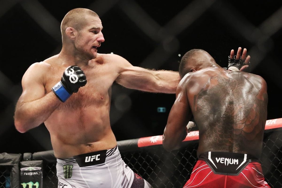 Sep 9, 2023; Sydney, NSW, AUSTRALIA; Israel Adesanya (red gloves) fights Sean Strickland (blue gloves) during UFC 293 at Qudos Bank Arena.