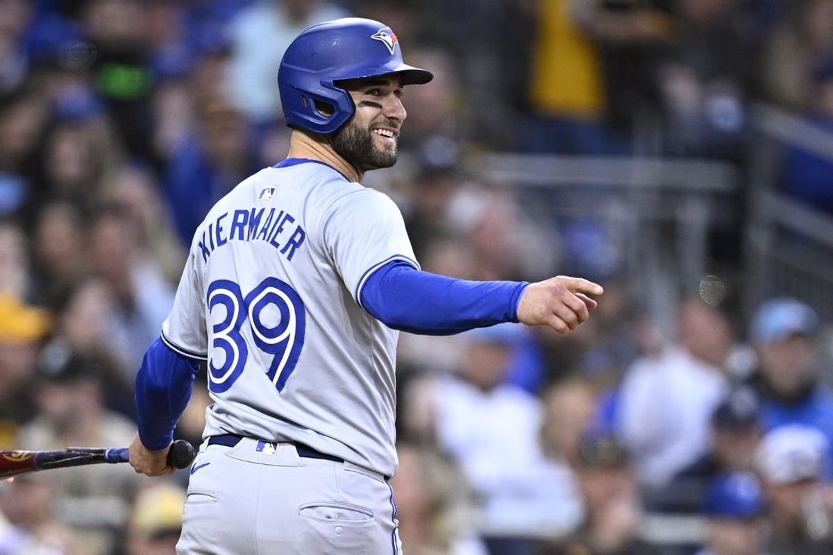 Apr 19, 2024; San Diego, California, USA; Toronto Blue Jays center fielder Kevin Kiermaier (39) gestures after scoring a run against the San Diego Padres during the second inning at Petco Park.