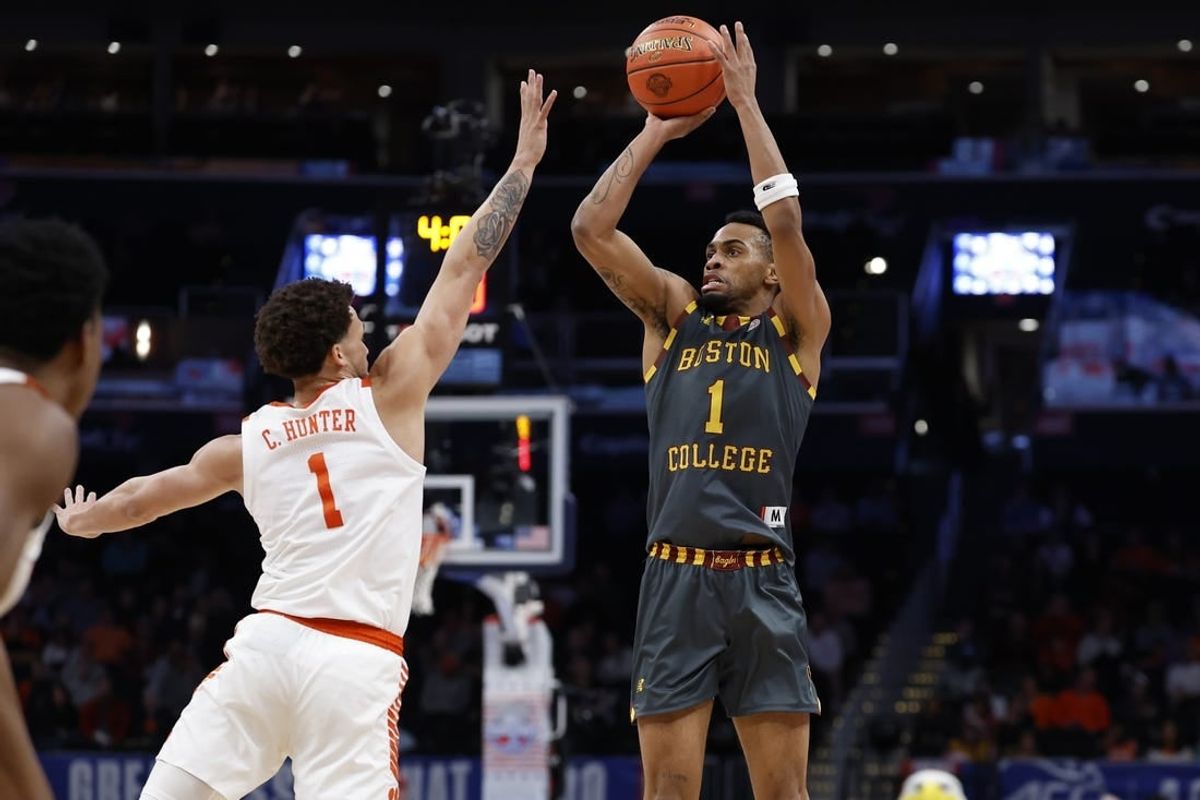 Mar 13, 2024; Washington, D.C., USA; Boston College Eagles guard Claudell Harris Jr. (1) shoots the ball over Clemson Tigers guard Chase Hunter (1) in the first half at Capital One Arena.