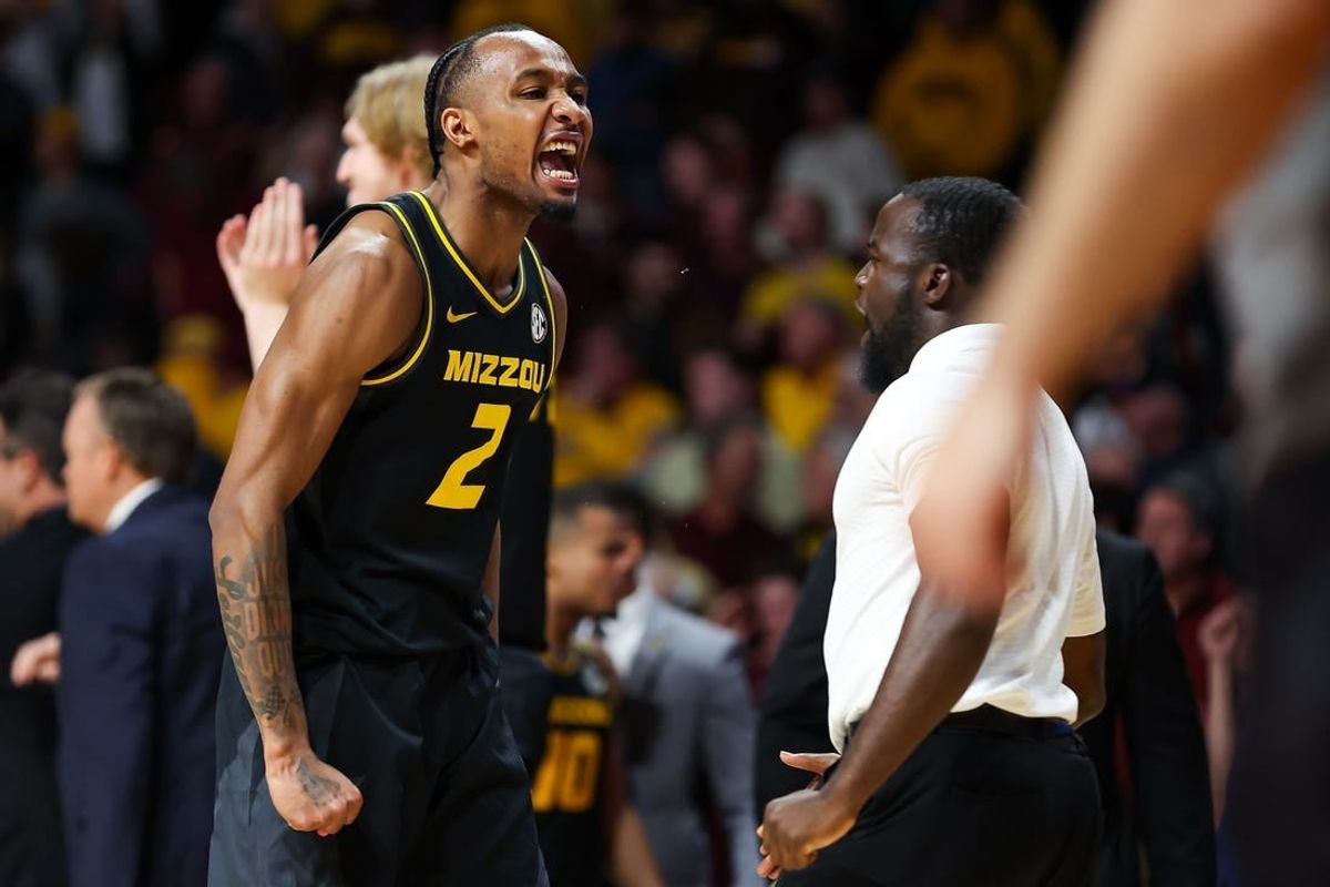 Nov 16, 2023; Minneapolis, Minnesota, USA; Missouri Tigers guard Tamar Bates (2) celebrates the win against the Minnesota Golden Gophers at Williams Arena.