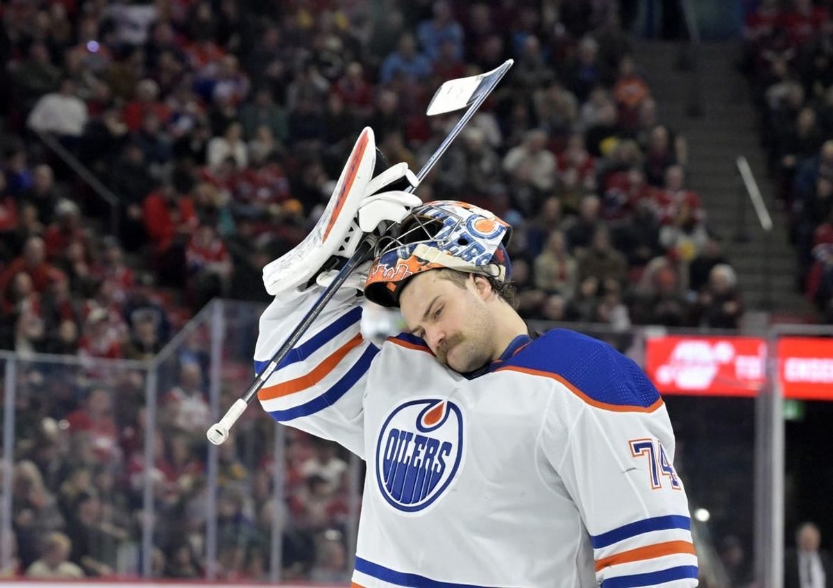 Jan 13, 2024; Montreal, Quebec, CAN; Edmonton Oilers goalie Stuart Skinner (74) puts his mask on during the second period of the game against the Montreal Canadiens  at the Bell Centre.