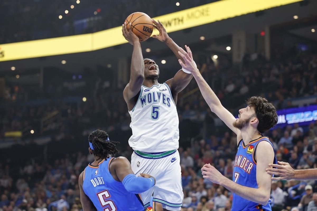 Jan 29, 2024; Oklahoma City, Oklahoma, USA; Minnesota Timberwolves guard Anthony Edwards (5) shoots as Oklahoma City Thunder forward Chet Holmgren (7) defends during the first quarter at Paycom Center.