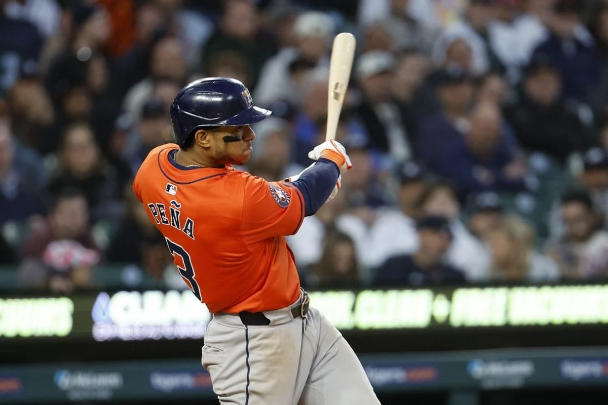May 10, 2024; Detroit, Michigan, USA;  Houston Astros shortstop Jeremy Pena (3) hits an RBI single in the eighth inning against the Detroit Tigers at Comerica Park.