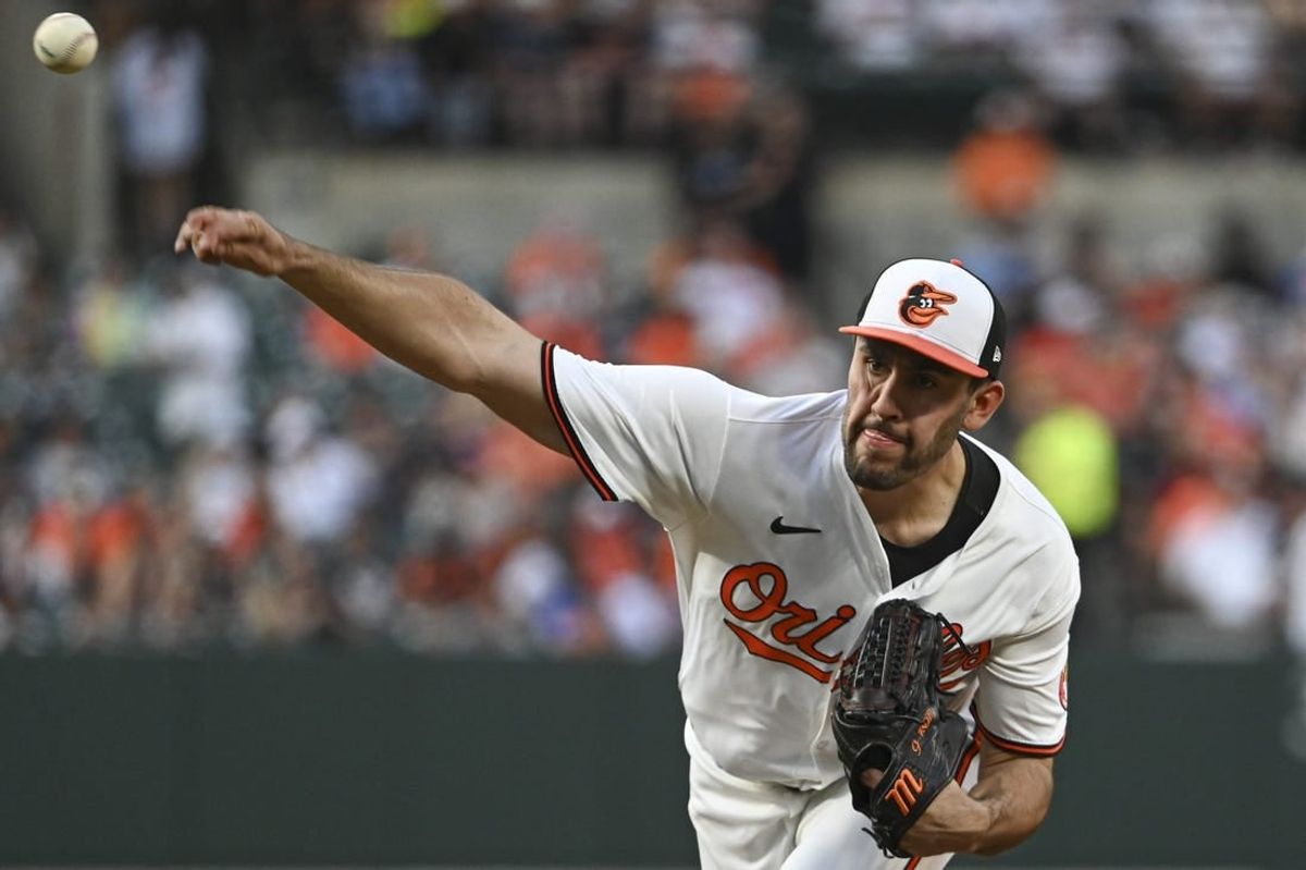 Apr 29, 2024; Baltimore, Maryland, USA;  Baltimore Orioles pitcher Grayson Rodriguez (30) throws a third inning pitch against the New York Yankees at Oriole Park at Camden Yards.