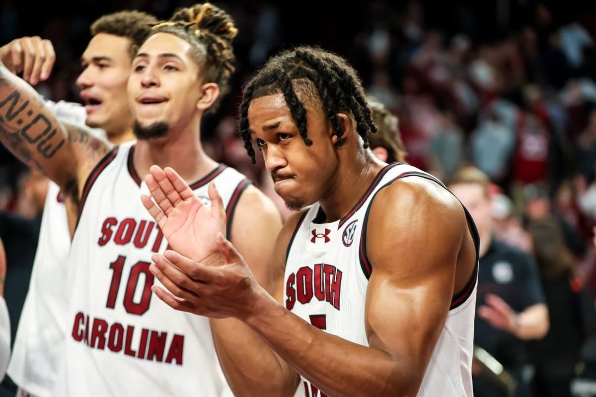 Jan 6, 2024; Columbia, South Carolina, USA; South Carolina Gamecocks guard Meechie Johnson (5) celebrates with this teammates following their victory over the Mississippi State Bulldogs at Colonial Life Arena.