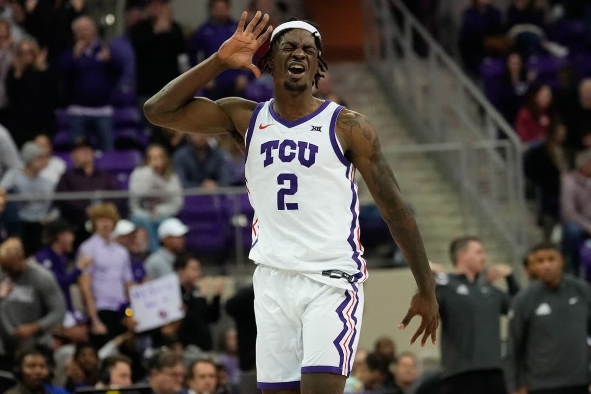 Jan 10, 2024; Fort Worth, Texas, USA; TCU Horned Frogs forward Emanuel Miller (2) celebrates after scoring against the Oklahoma Sooners during the second half at Ed and Rae Schollmaier Arena.