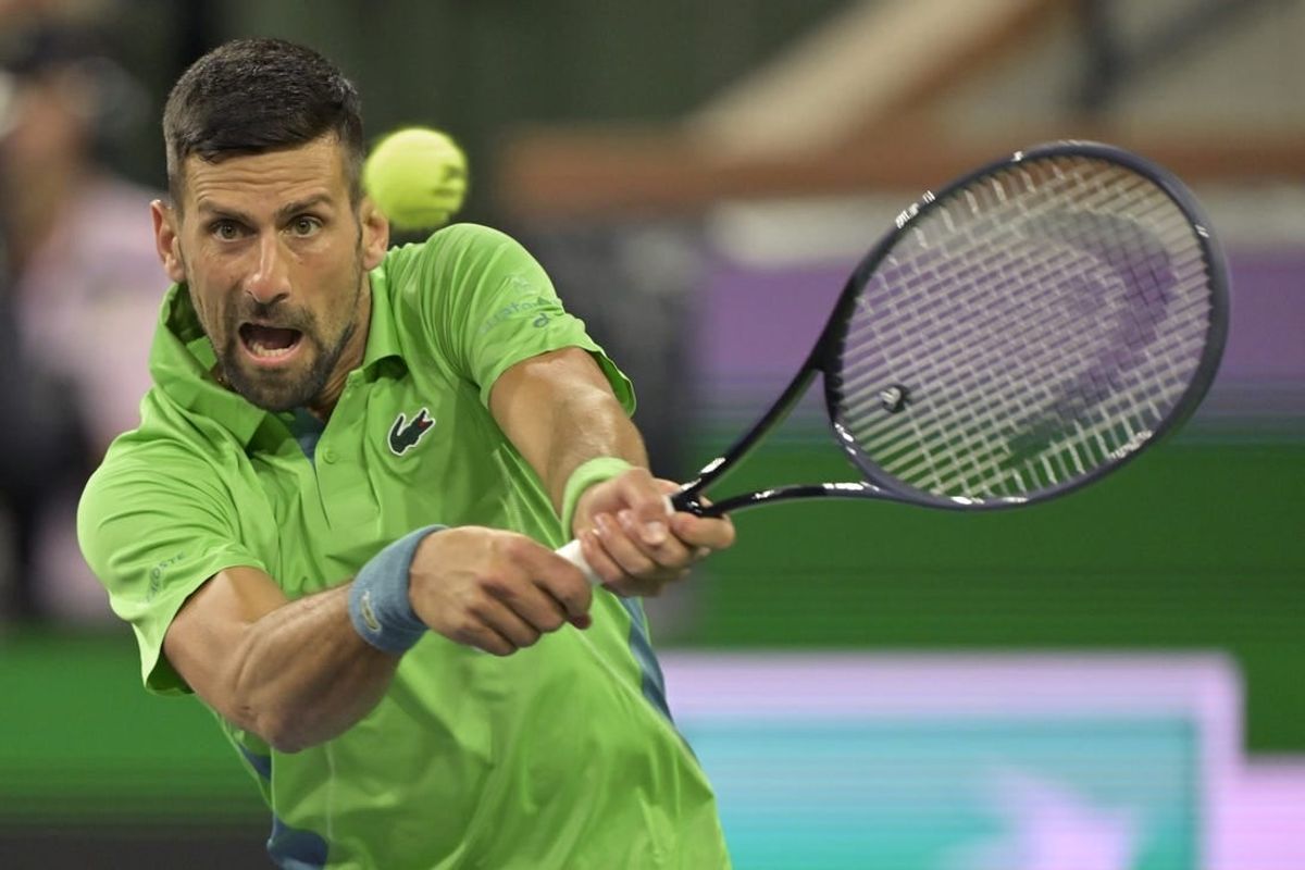 Mar 11, 2024; Indian Wells, CA, USA;  Novak Djokovic (SRB) hits a shot in his third round match against Luca Nardi (ITA) in the BNP Paribas Open at the Indian Wells Tennis Garden.
