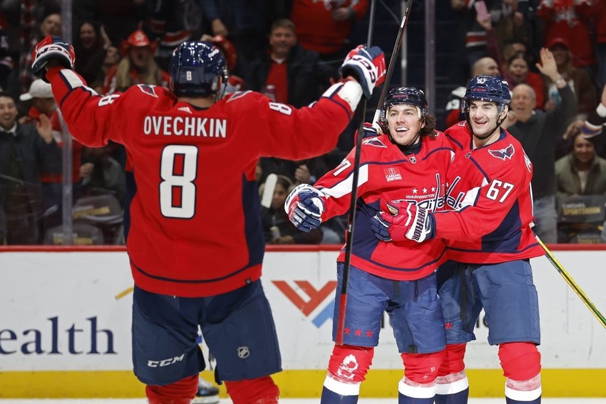 Jan 18, 2024; Washington, District of Columbia, USA; Washington Capitals right wing T.J. Oshie (77) celebrates with Capitals left wing Max Pacioretty (67) after scoring a goal against the St. Louis Blues in the first period at Capital One Arena.
