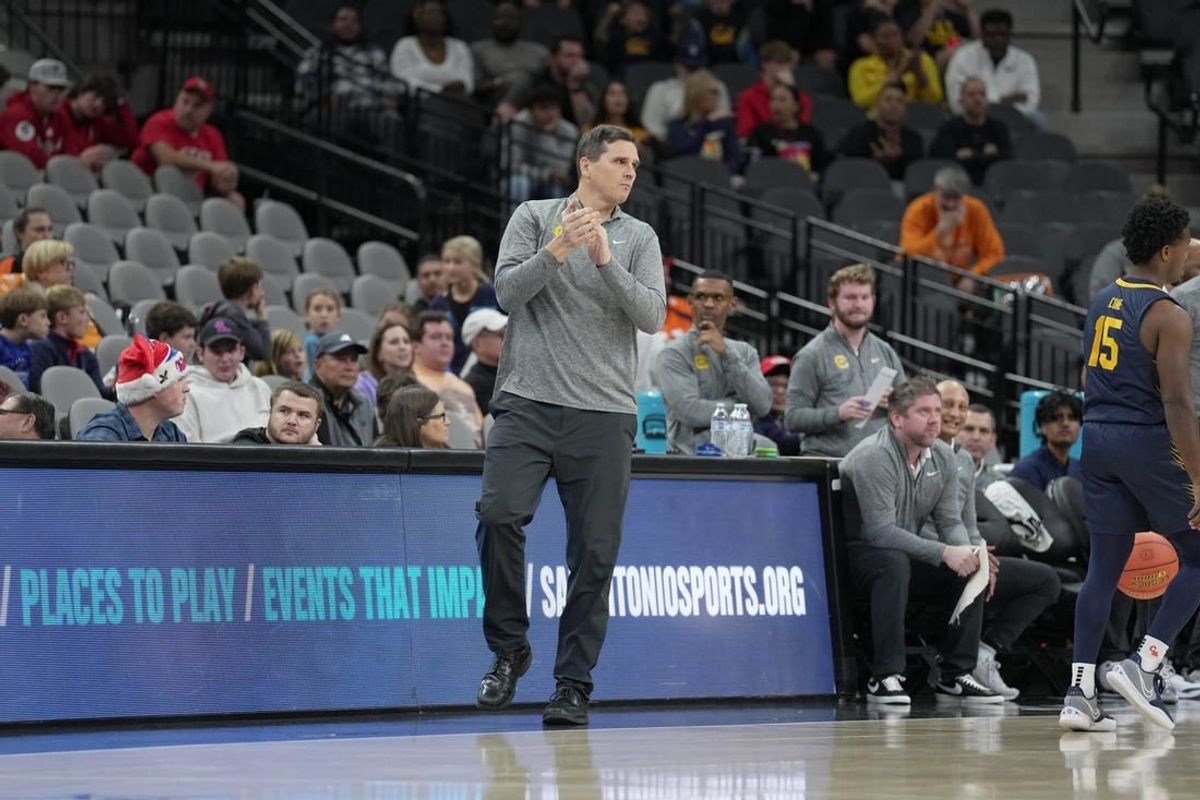 Dec 16, 2023; San Antonio, Texas, USA;  California Golden Bears head coach Mark Madsen looks on in the first half against the Mississippi Rebels at the Frost Bank Center.