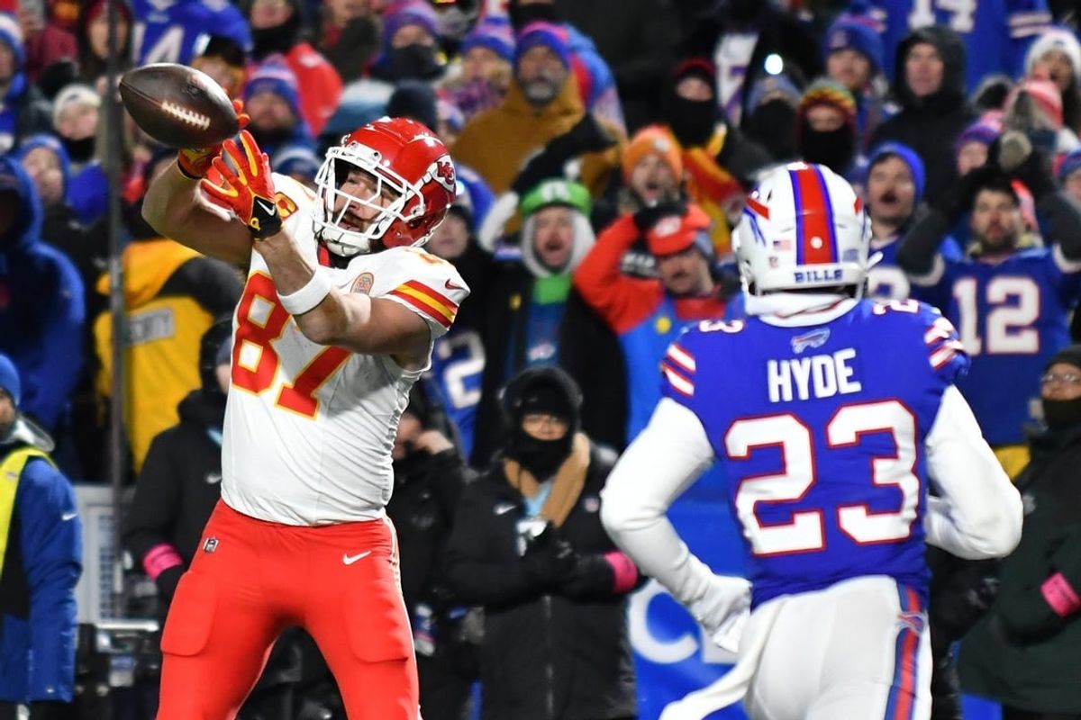 Jan 21, 2024; Orchard Park, New York, USA; Kansas City Chiefs tight end Travis Kelce (87) makes a catch for a touchdown against the Buffalo Bills in the first half of the 2024 AFC divisional round game at Highmark Stadium.