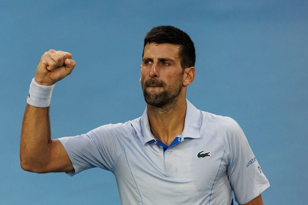 Jan 23, 2024; Melbourne, Victoria, Australia;  Novak Djokovic of Serbia celebrates his victory against Taylor Fritz of the United States in the quarter final of the men s singles.