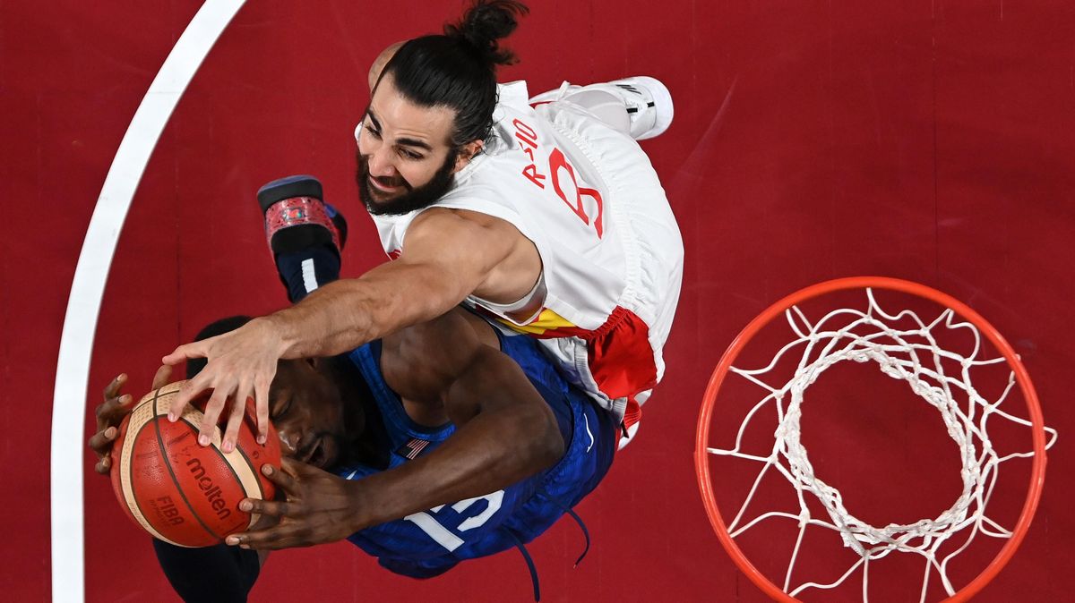 Ricky  Rubio  blocks  Bam  Adebayo during the Team USA men’s win over Spain.