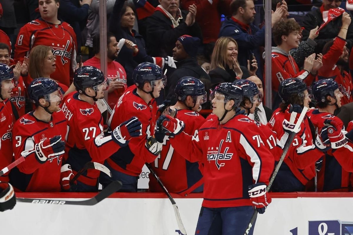 Mar 1, 2024; Washington, District of Columbia, USA; Washington Capitals defenseman John Carlson (74) celebrates with teammates after scoring a goal against the Philadelphia Flyers in the second period at Capital One Arena.