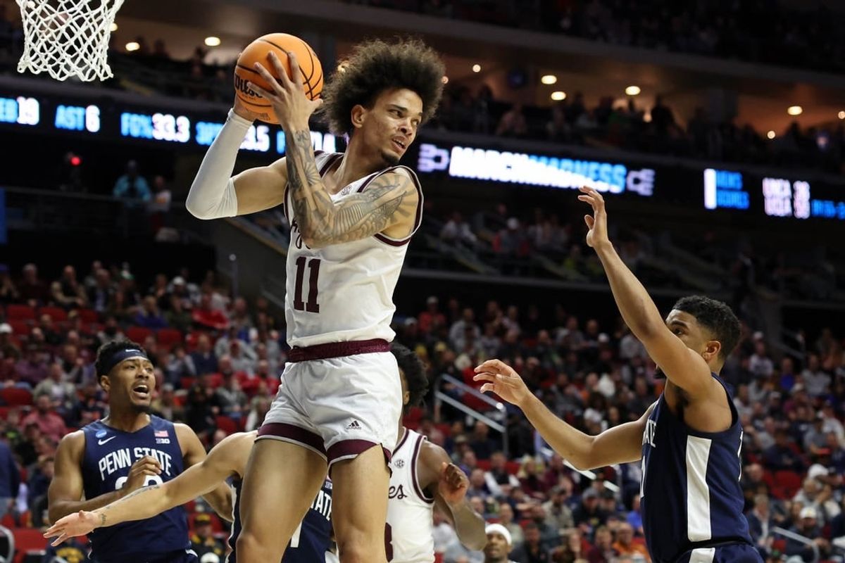 Mar 16, 2023; Des Moines, IA, USA; Texas A&M Aggies forward Andersson Garcia (11) grabs the ball against the Penn State Nittany Lions during the first half at Wells Fargo Arena.