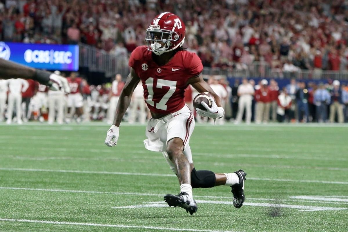 Dec 2, 2023; Atlanta, GA, USA; Alabama Crimson Tide wide receiver Isaiah Bond (17) runs for a touchdown against the Georgia Bulldogs in the fourth quarter at Mercedes-Benz Stadium.