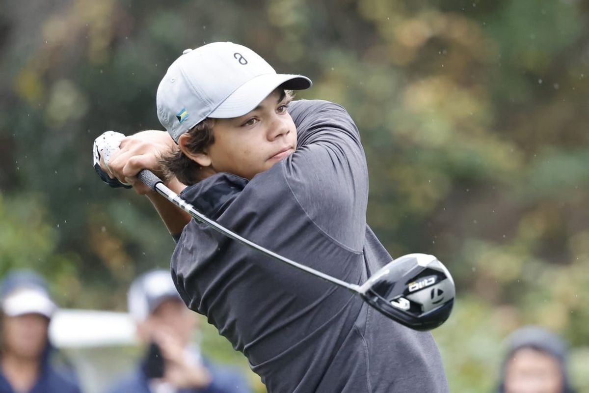 Dec 16, 2023; Orlando, Florida, USA; Charlie Woods plays his shot from the sixth tee during the PNC Championship at The Ritz-Carlton Golf Club.