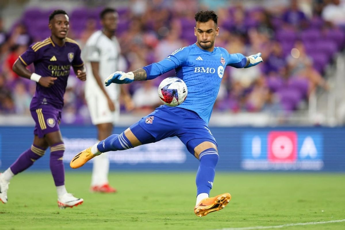 Jul 4, 2023; Orlando, Florida, USA;  Toronto FC goalkeeper Greg Ranjitsingh (18) puts the ball in play against Orlando City SC in the first half at Exploria Stadium.