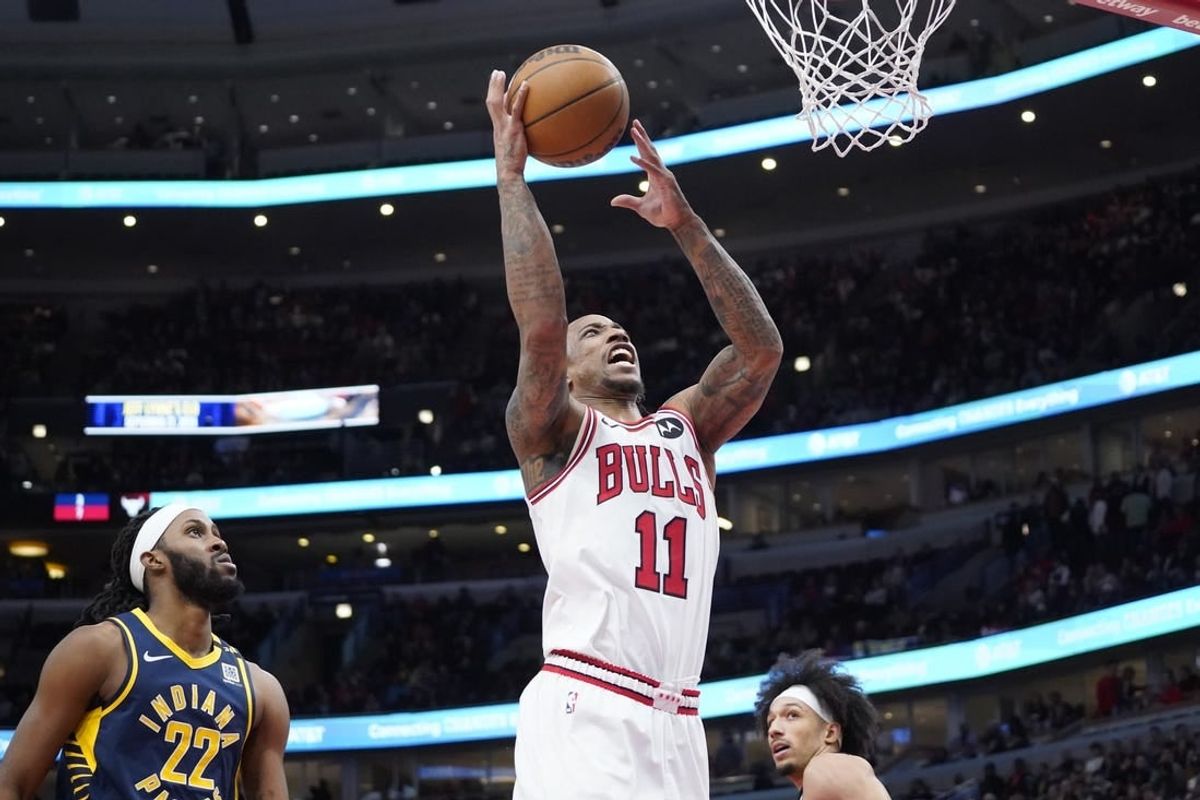 Mar 27, 2024; Chicago, Illinois, USA; Chicago Bulls forward DeMar DeRozan (11) is defended by Indiana Pacers forward Isaiah Jackson (22) during the second half at United Center.