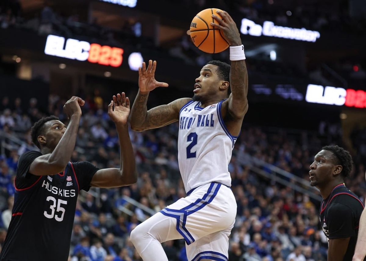 Dec 20, 2023; Newark, New Jersey, USA; Seton Hall Pirates guard Al-Amir Dawes (2) drives to the basket as Connecticut Huskies forward Samson Johnson (35) defends during the second half at Prudential Center.