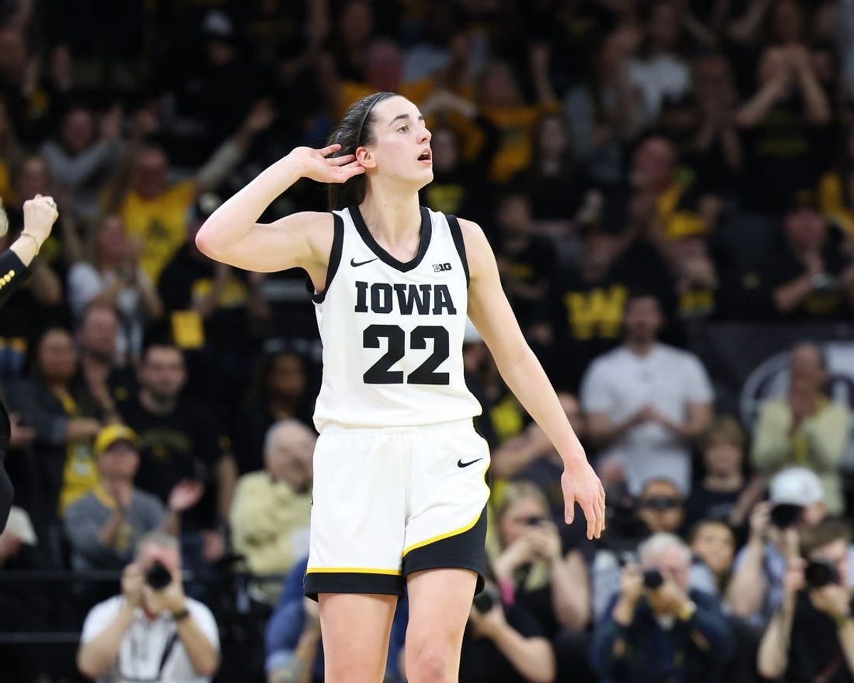 Mar 3, 2024; Iowa City, Iowa, USA; Iowa Hawkeyes guard Caitlin Clark (22) celebrates the win over the Ohio State Buckeyes during the second half at Carver-Hawkeye Arena.