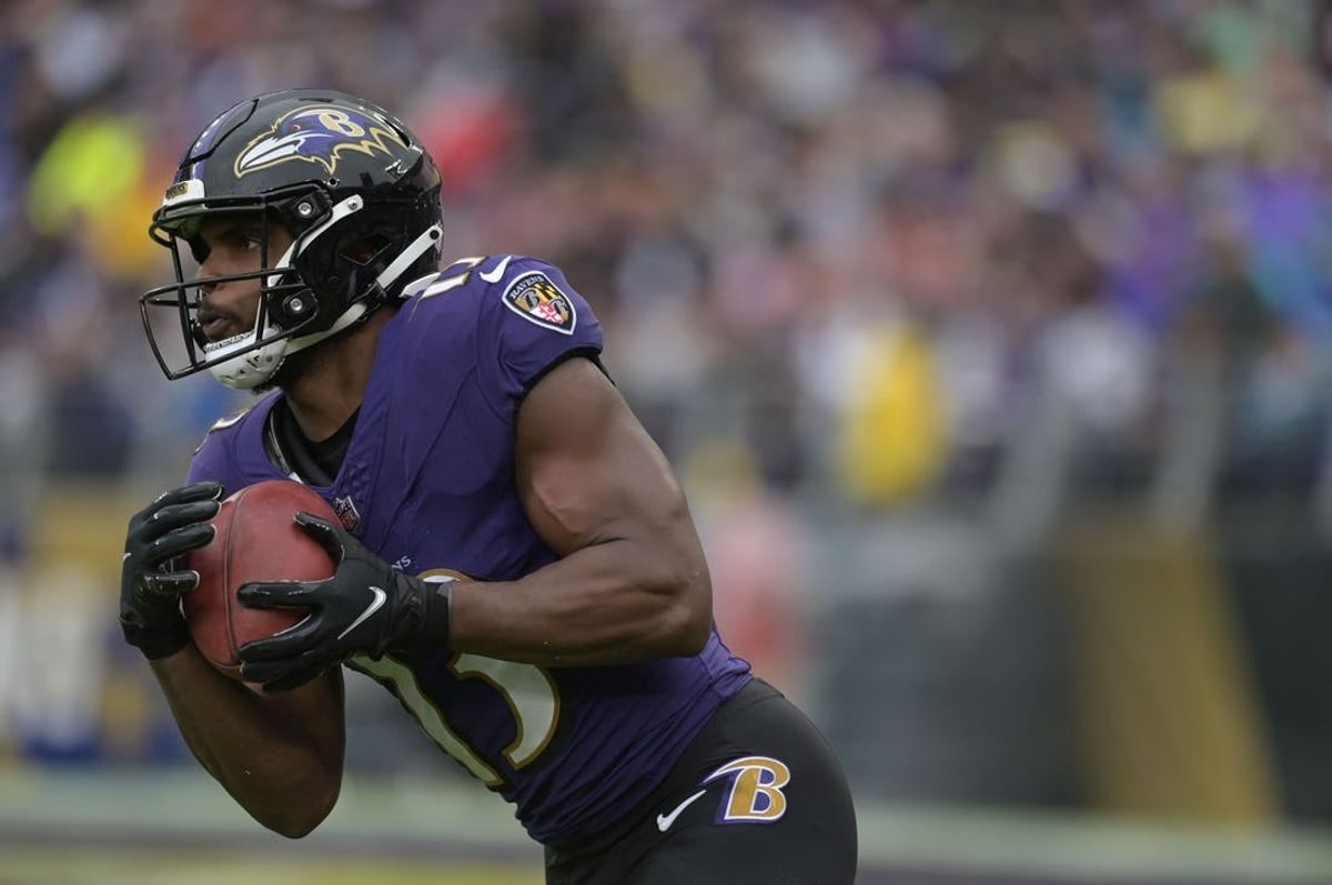 Sep 24, 2023; Baltimore, Maryland, USA; Baltimore Ravens wide receiver Devin Duvernay (13) returns a kick during the game against the Indianapolis Colts at M&T Bank Stadium.